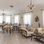 Отель Ostria Адамас